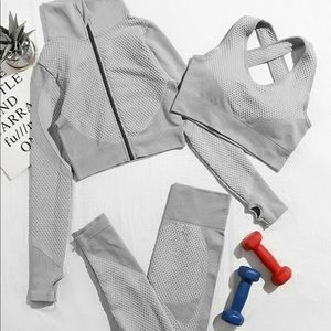 3pcs sports bra, jacket, & leggings.